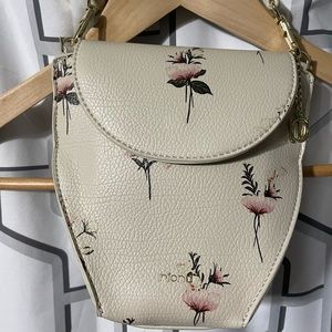 Riona soho RFID floral trapeze evening bag.
